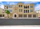 Attractive condo building featuring multiple garages, balconies, and a well-maintained facade at 2555 Hampton Rd # 9307, Henderson, NV 89052