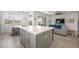 Kitchen transitions to living and dining areas with stainless appliances, an eat-in nook, and open floor plan concept at 2555 Hampton Rd # 9307, Henderson, NV 89052