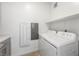 A view of the laundry room with modern white appliances at 2555 Hampton Rd # 9307, Henderson, NV 89052