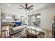 Bright, airy living room featuring an open floor plan and access to a balcony at 2555 Hampton Rd # 9307, Henderson, NV 89052