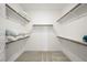 Walk-in closet with ample shelving and rod space for organized storage at 2555 Hampton Rd # 9307, Henderson, NV 89052