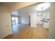 Open living and kitchen space with sliding glass door access to balcony at 2606 S Durango Dr # 165, Las Vegas, NV 89117
