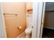 Powder room with toilet and cabinet at 2787 Sunken Ship St, Laughlin, NV 89029