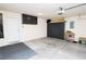 Spacious garage featuring ample storage cabinets and a convenient garage door opener at 2787 Sunken Ship St, Laughlin, NV 89029