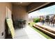 Relaxing covered patio with outdoor seating and views of the landscaped backyard at 2787 Sunken Ship St, Laughlin, NV 89029