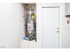 Efficient water heater, adjacent to a utility access door at 2787 Sunken Ship St, Laughlin, NV 89029