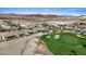 Picturesque aerial view of homes backing onto the lush green golf course at 305 Via Del Duomo, Henderson, NV 89011