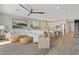 Comfortable living room offering modern decor, an open layout, and seamlessly connected to the kitchen at 305 Via Del Duomo, Henderson, NV 89011