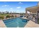 Backyard with pool, spa, covered patio with outdoor kitchen and beautiful view of the golf course at 305 Via Del Duomo, Henderson, NV 89011