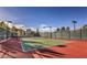 A view of the community tennis courts and desert surroundings at 305 Via Del Duomo, Henderson, NV 89011