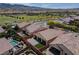 This aerial view shows the home's backyard and surrounding community at 3084 Porte La Paz Ave, Henderson, NV 89044