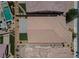 This aerial view shows the red tile roof, paver patio, and artificial turf at 3084 Porte La Paz Ave, Henderson, NV 89044