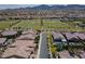 Overhead shot of Southwestern home, community park and green spaces at 3084 Porte La Paz Ave, Henderson, NV 89044