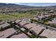 Beautiful aerial view of Southwestern home featuring a private backyard, patio, and community park at 3084 Porte La Paz Ave, Henderson, NV 89044