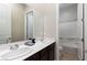 Bathroom with double sink vanity and shower-tub combo at 3084 Porte La Paz Ave, Henderson, NV 89044