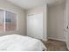 Bedroom with carpet, sliding door closet and natural light at 3084 Porte La Paz Ave, Henderson, NV 89044