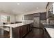 Spacious kitchen featuring a large island, stainless steel appliances, and granite countertops at 3084 Porte La Paz Ave, Henderson, NV 89044