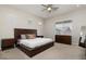 Bedroom featuring a wooden bed frame, carpet floors, and natural light at 3084 Porte La Paz Ave, Henderson, NV 89044
