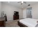 Main bedroom with neutral walls, carpet floors, and a dresser at 3084 Porte La Paz Ave, Henderson, NV 89044