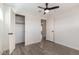 This bedroom features a ceiling fan and a spacious closet for storage and organization at 3308 Navajo Way, Las Vegas, NV 89108
