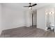 This bedroom features a ceiling fan and an ensuite bathroom for convenience and privacy at 3308 Navajo Way, Las Vegas, NV 89108