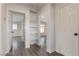 Hallway featuring a shelving unit and plenty of natural light at 3308 Navajo Way, Las Vegas, NV 89108