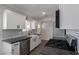 Bright kitchen features stainless appliances, granite counters, undermount sink and custom backsplash at 3308 Navajo Way, Las Vegas, NV 89108