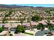 Desirable neighborhood with homes with back yard pools, solar panels, and manicured lawns at 335 Pleasant Summit Dr, Henderson, NV 89012