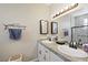 Modern bathroom with granite countertop, and vessel sinks, decorative lighting, and a tiled walk-in shower at 335 Pleasant Summit Dr, Henderson, NV 89012