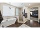 Luxurious bathroom with a standalone tub and tiled glass shower enclosure at 335 Pleasant Summit Dr, Henderson, NV 89012