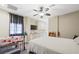 Bright bedroom featuring built in storage and a large window, creating a serene and comfortable living space at 335 Pleasant Summit Dr, Henderson, NV 89012