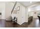 Entryway with hardwood floors, staircase and view to the kitchen at 335 Pleasant Summit Dr, Henderson, NV 89012