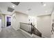 Spacious hallway with neutral carpet, railing and views of other rooms at 335 Pleasant Summit Dr, Henderson, NV 89012