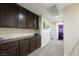 Hallway with carpet, built-in cabinets and drawers, and a view of other rooms at 335 Pleasant Summit Dr, Henderson, NV 89012