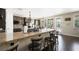 Kitchen with granite countertops, dark wood cabinets, and counter seating at 335 Pleasant Summit Dr, Henderson, NV 89012