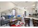 Bright living room features hardwood floors, comfortable seating, and an open layout, perfect for both casual living and entertaining at 335 Pleasant Summit Dr, Henderson, NV 89012