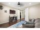 Spacious living room with hardwood floors, blue area rug and neutral paint at 335 Pleasant Summit Dr, Henderson, NV 89012