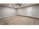 Spacious bedroom with ceiling fan and neutral carpet at 3572 Tempe St, Las Vegas, NV 89103