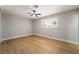 Bedroom features wood floors, a ceiling fan, and a window with wood shutters at 3572 Tempe St, Las Vegas, NV 89103