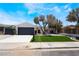 Beautiful single-Gathering home boasting a well-kept lawn and attached two-car garage at 3572 Tempe St, Las Vegas, NV 89103