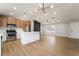 Open-concept kitchen with stainless steel appliances, white countertops and an island at 3572 Tempe St, Las Vegas, NV 89103
