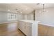 Kitchen island featuring white cabinets with modern gold handles at 3572 Tempe St, Las Vegas, NV 89103