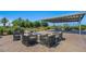 Inviting community space with modern seating around a fire pit and shaded seating areas at 4130 E Brusca Way, Pahrump, NV 89061