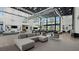 Expansive lobby with high ceilings, modern seating, and floor-to-ceiling windows showcasing the outdoor scenery at 4130 E Brusca Way, Pahrump, NV 89061