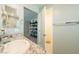 Modern bathroom with granite countertops, ample storage, and stylish mirror at 440 Blue Lark Dr, Henderson, NV 89011
