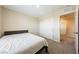 Bedroom featuring a bed, closet with sliding doors, and neutral walls at 440 Blue Lark Dr, Henderson, NV 89011