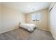Bedroom with carpet, window with blinds, neutral walls and a closet with sliding doors at 440 Blue Lark Dr, Henderson, NV 89011