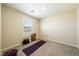 Carpeted bedroom featuring one window, neutral walls, and ample space at 440 Blue Lark Dr, Henderson, NV 89011