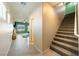 Inviting entryway showcasing staircase, bright living space, and natural light at 440 Blue Lark Dr, Henderson, NV 89011