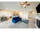 Spacious living area seamlessly connects the kitchen and dining spaces, perfect for modern living at 440 Blue Lark Dr, Henderson, NV 89011